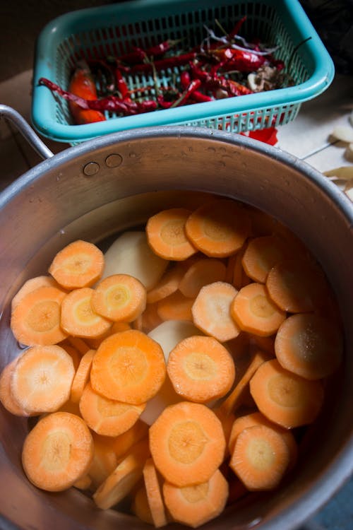 Free stock photo of carrots, chopped, pan