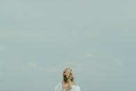 Blue Sky over Blonde Woman