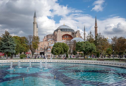 Free City View with Mosque and Fountain Stock Photo