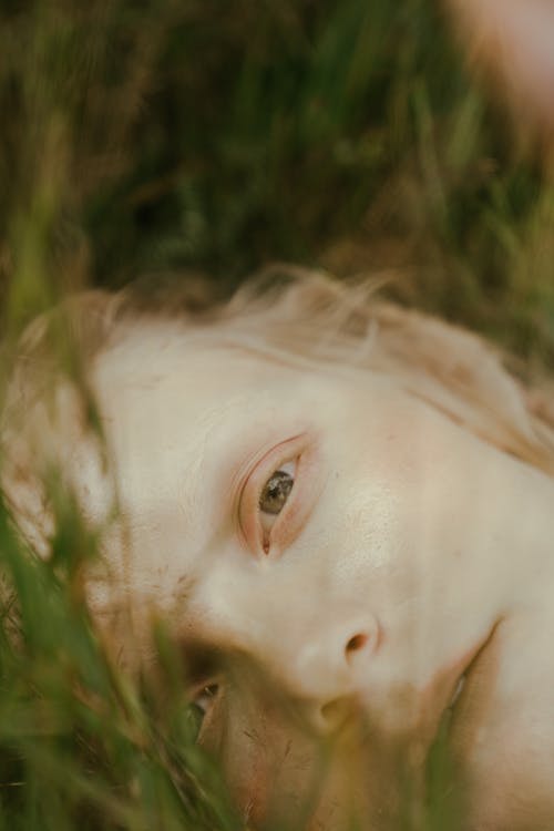 Close-up of Girl on Green Grass