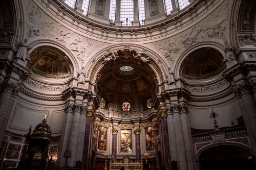 Free Ornate architectural details inside a historic cathedral, showcasing religious art and grandeur. Stock Photo