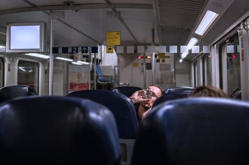 Free People on Seats in Modern Train Stock Photo