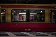 Red and Black Train in Train Station