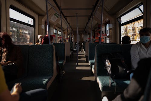 People Sitting in City Train