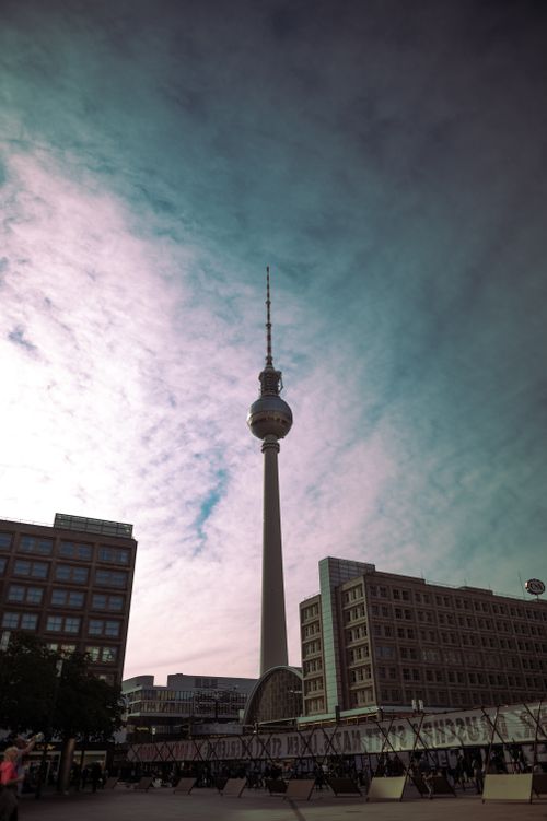 Free Stunning view of Berlin's TV Tower against a dramatic evening sky. Stock Photo