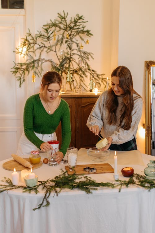 Free Two Girls Making Christmas Cookies Stock Photo
