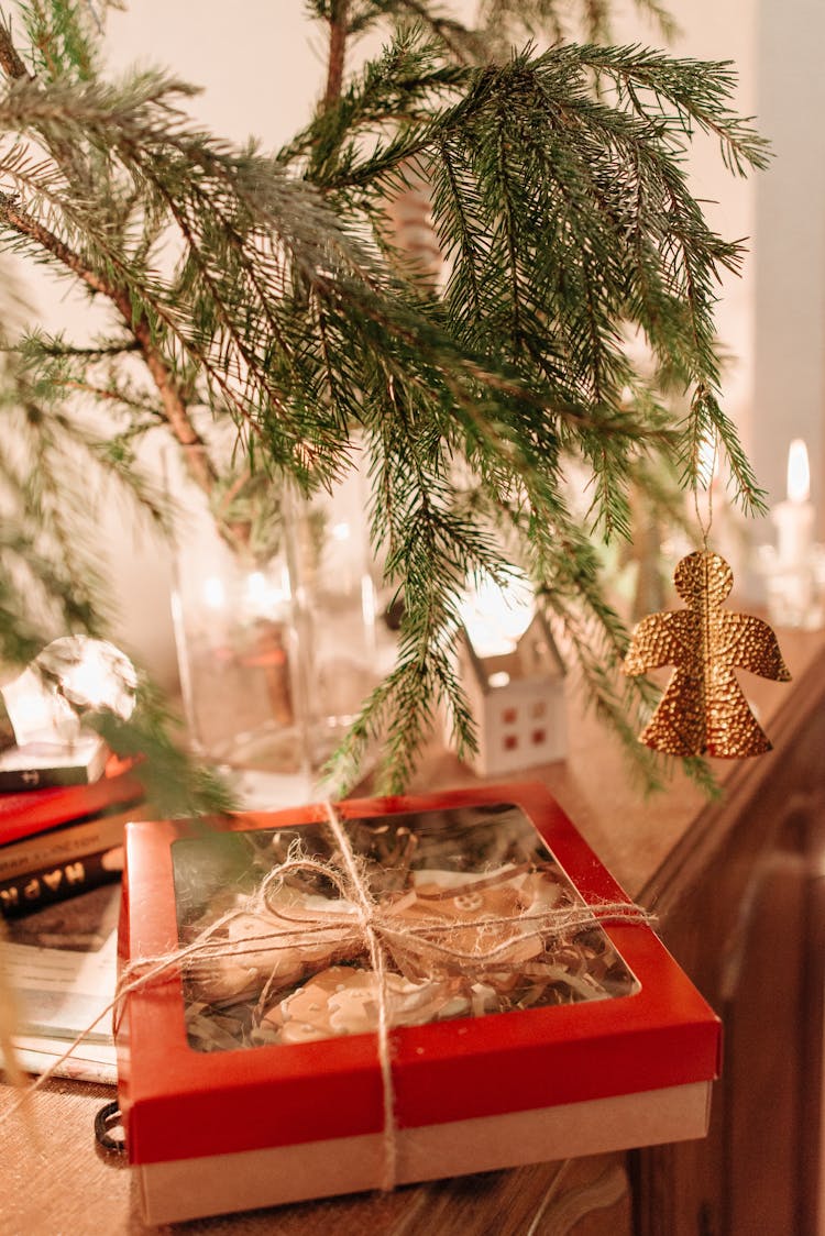 A Box Of Gingerbread Cookies On Wooden Table