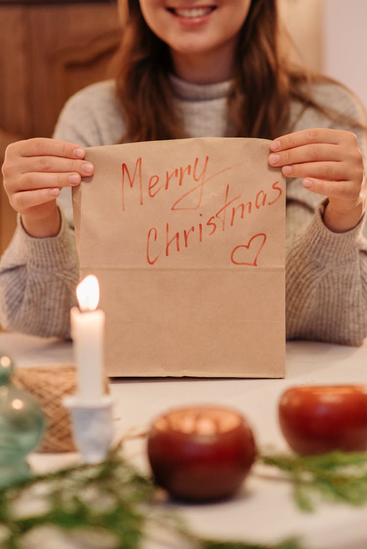 A Happy Woman Holding Paper Bag