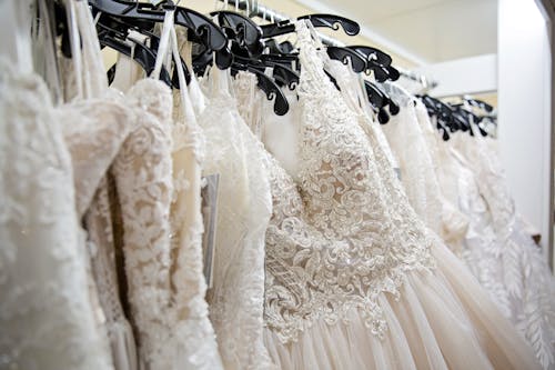 Wedding Dresses Hanging on a Cloth Rack