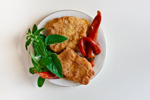 Free Fried fish with chili pepper and mint Stock Photo