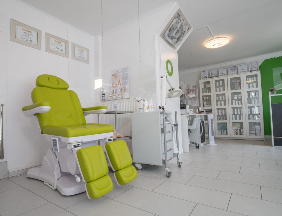 Modern wellness clinic treatment room with professional equipment and clean interior