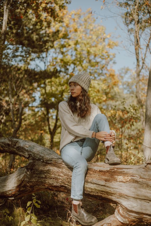 Woman in jeans and heeled boots, elevated look