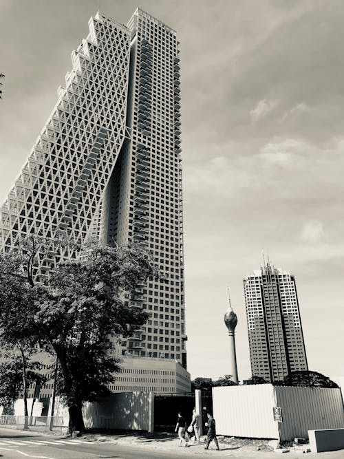 Grayscale Photo of High Rise Building