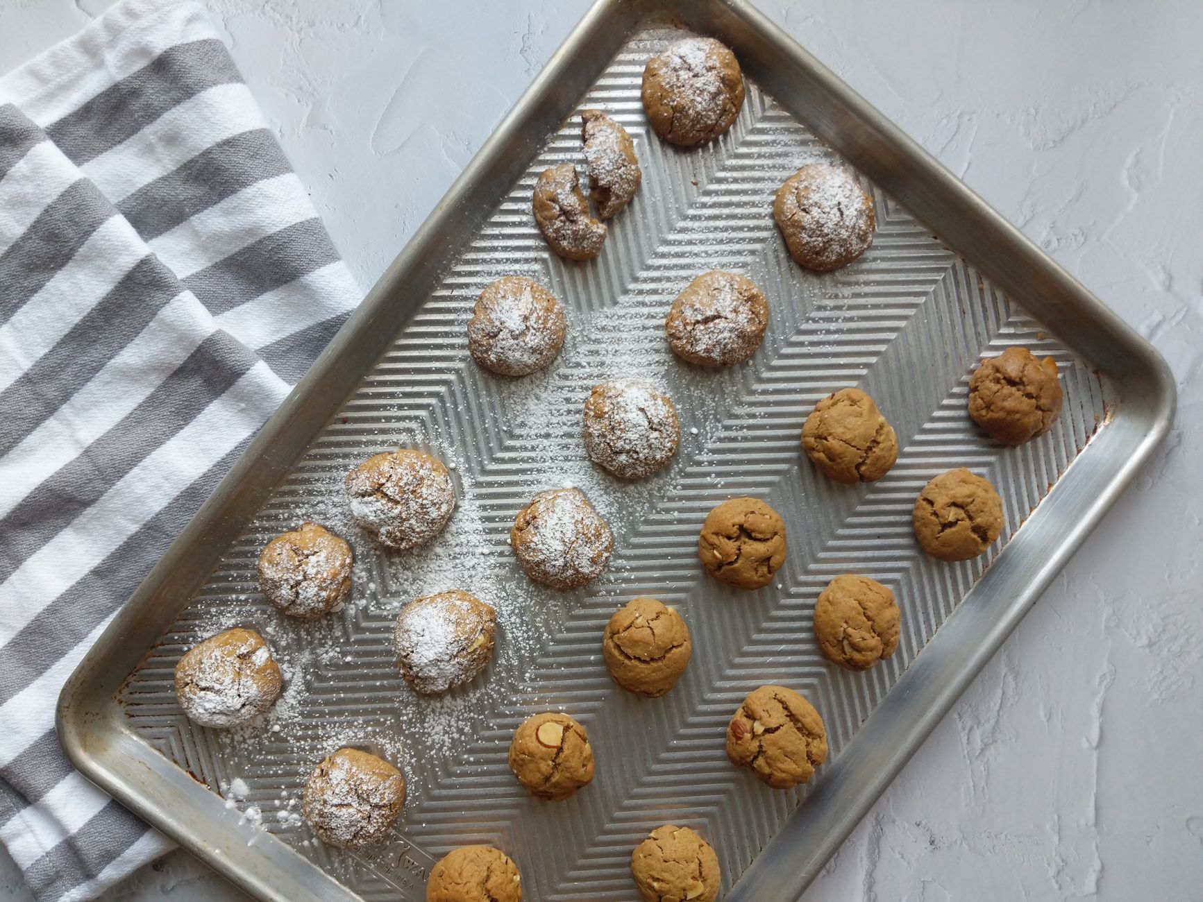 A cozy tea setup with meltaway cookies on a rustic plate