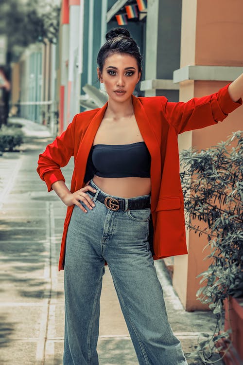 A Woman in a Red Blazer Posing
