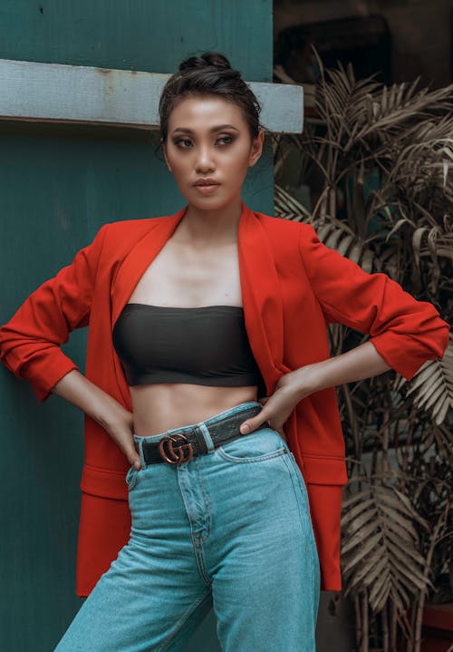 A Woman in a Red Blazer Posing