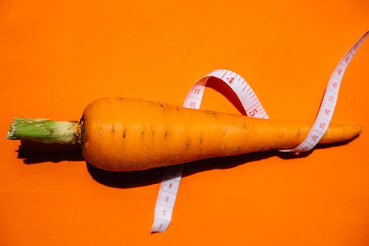 Carrot On Orange Background