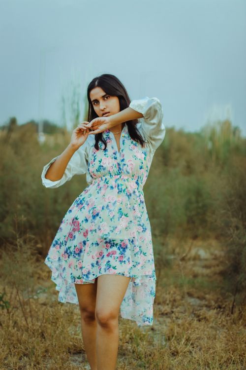 Tranquil young lady in romantic dress on grassy meadow Free Stock Photo Tranquil young lady in romantic dress on grassy meadow Free Stock Photo
