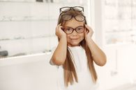 Child Choosing Eyeglasses