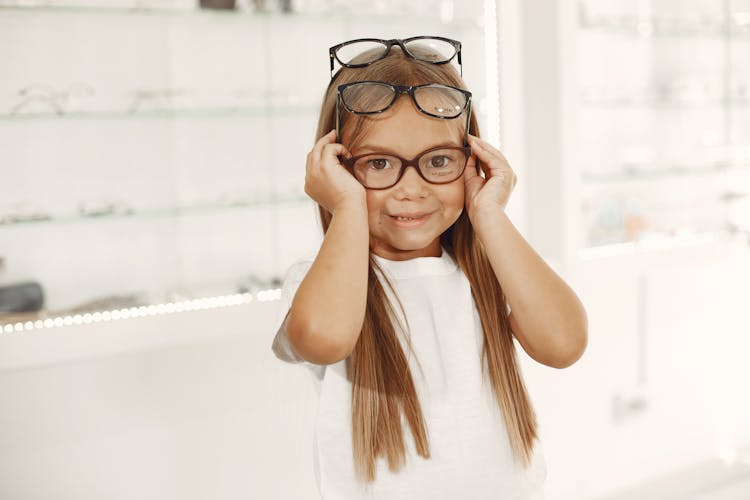 Child Choosing Eyeglasses