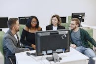 People Sitting in Front of Computer