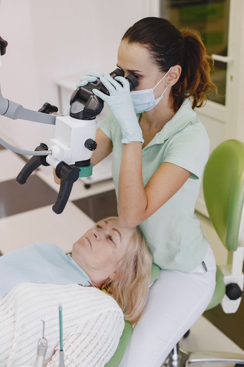 Elderly woman during a medical examination at the dentist