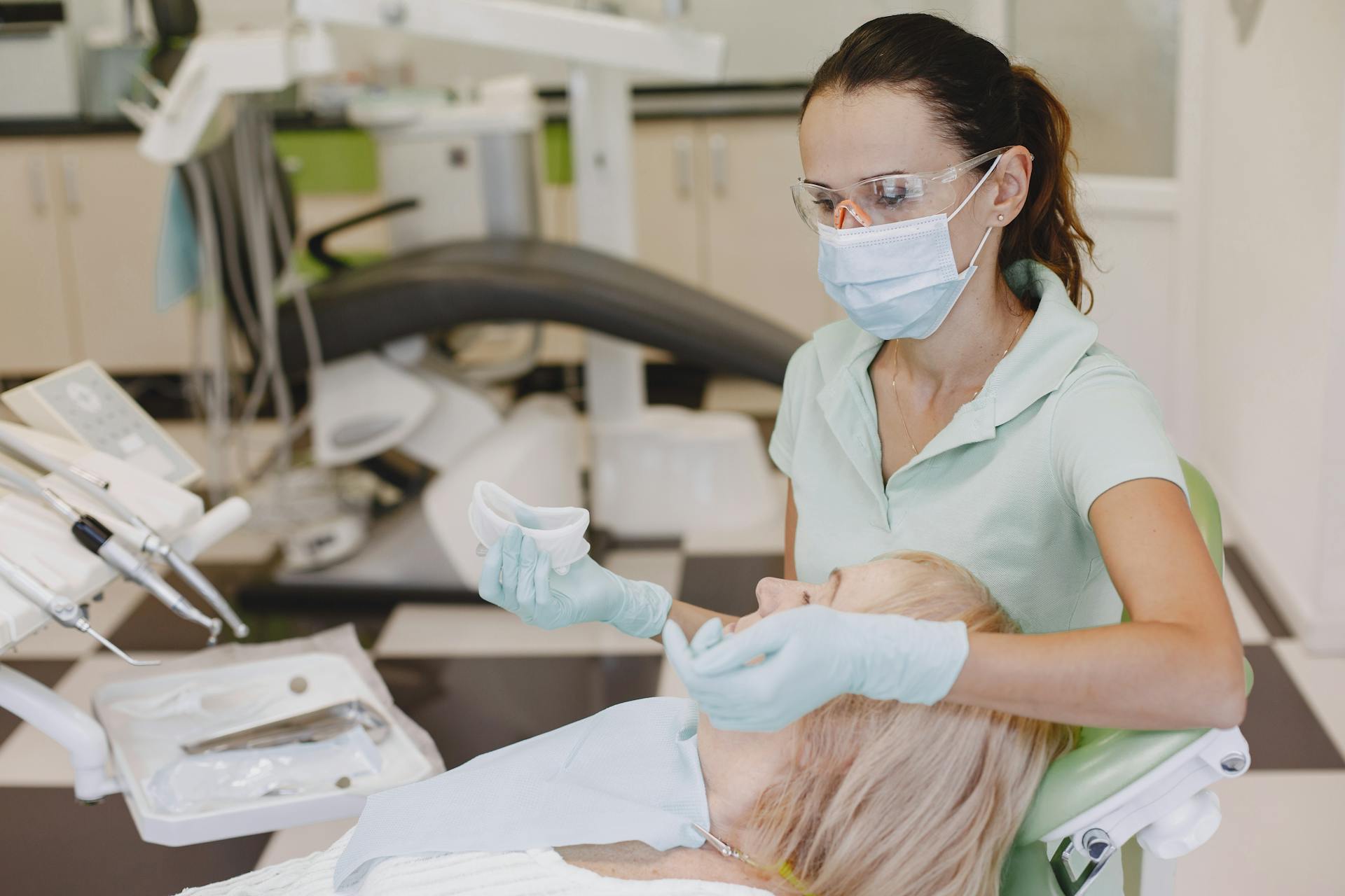 Photo of a Woman during a Visit at the Dentist