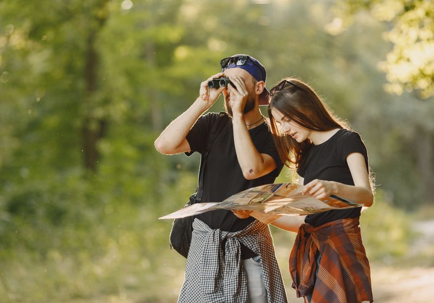 couple enjoying coffee at outdoor cafe while dating online