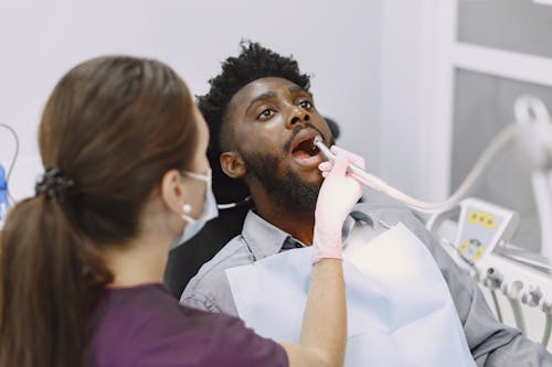 Dentist Holding Drill
