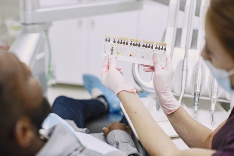 Dentist discussing treatment options with a patient