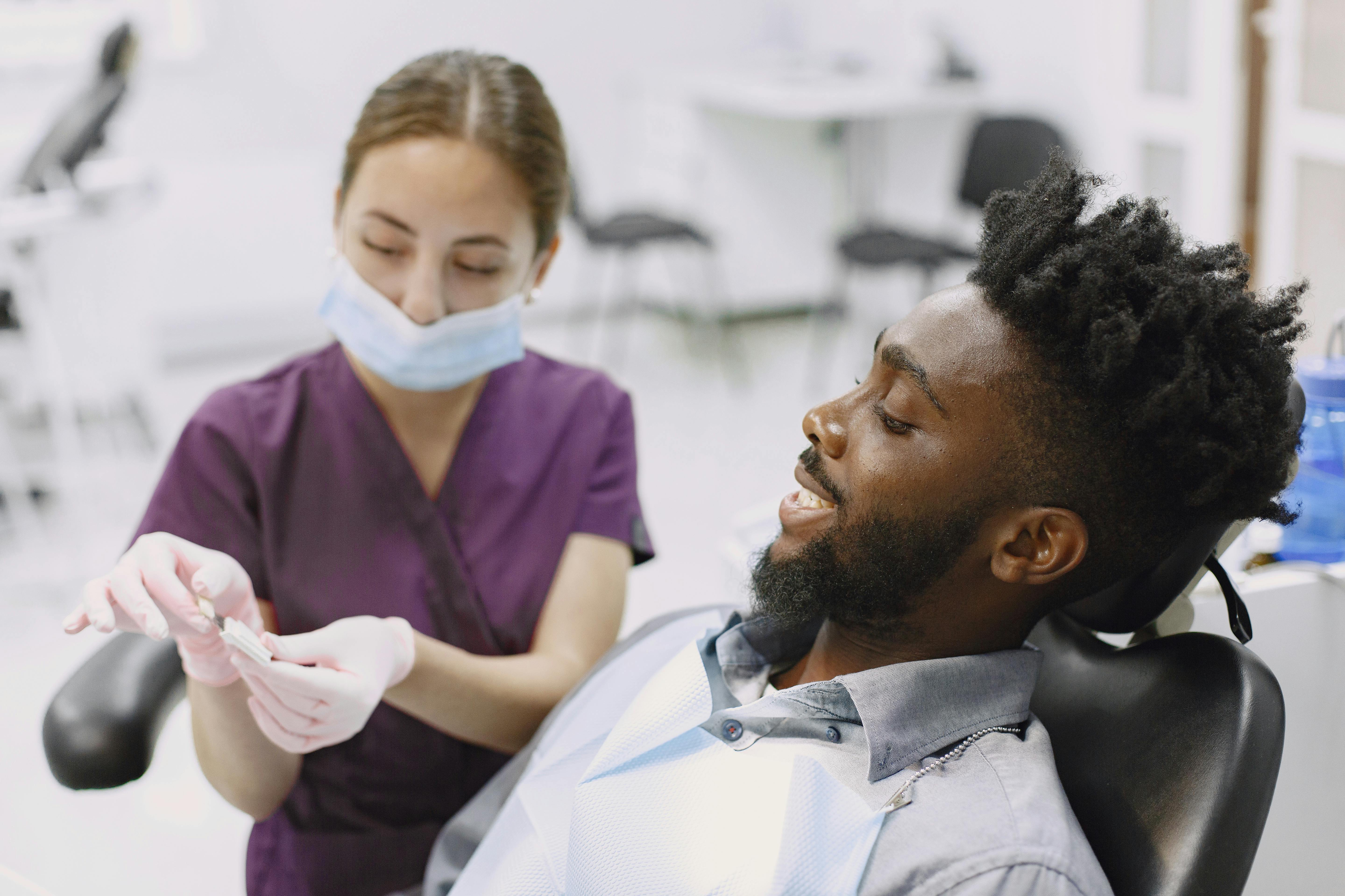 A relaxed patient resting comfortably in a dental chair during a sedation procedure - Sedation dentist Glendale