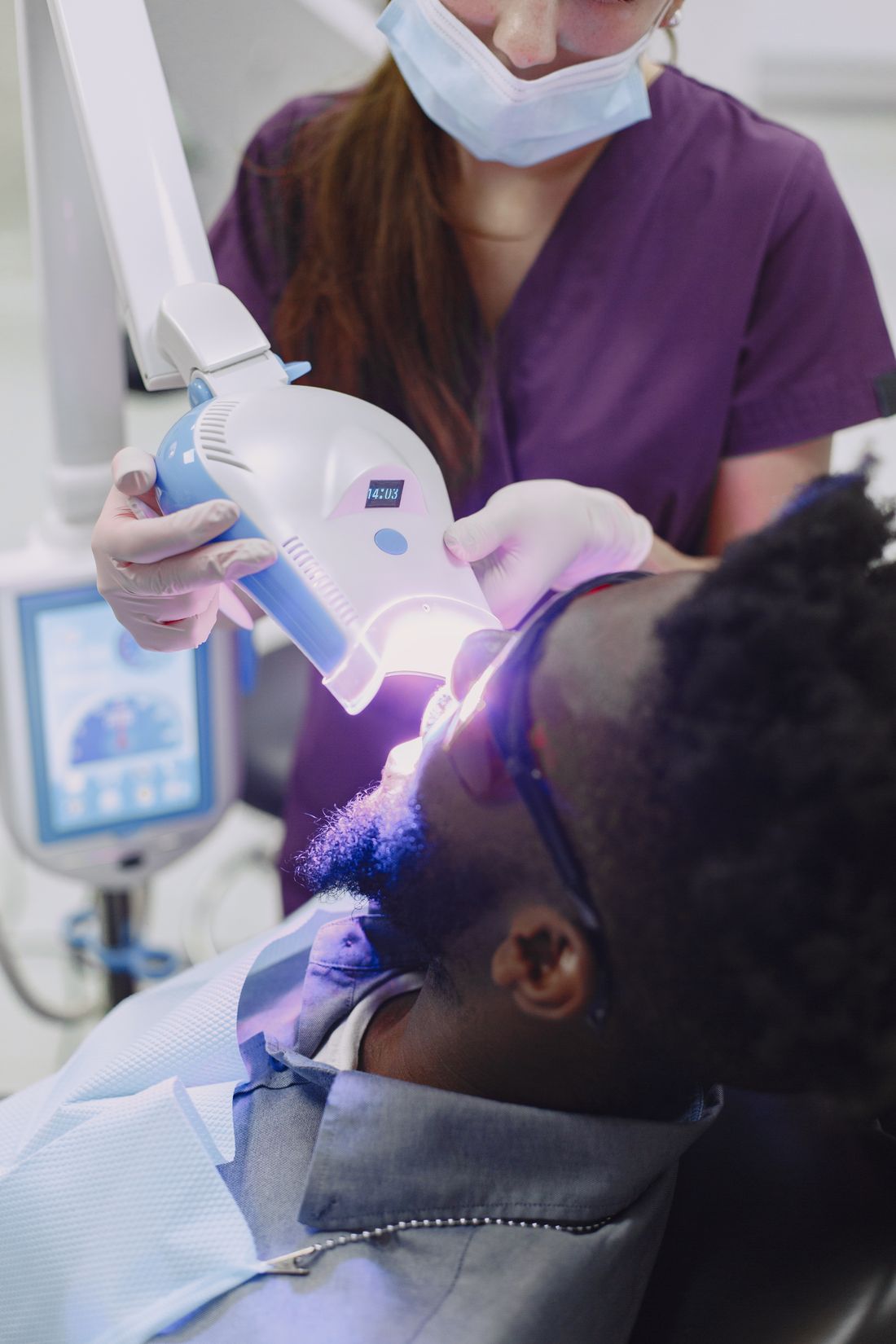A patient in a dental chair during a routine appointment
