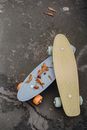 Various skateboards on asphalt street in city