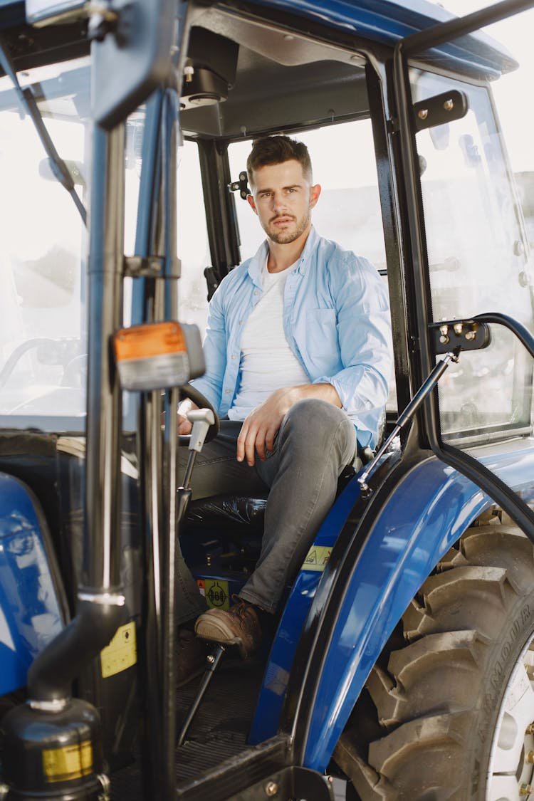 Farmer In Tractor