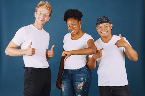 Three People Smiling at Camera