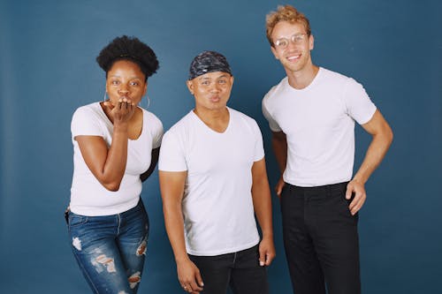 Three People Smiling at Camera