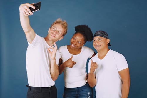 Three People Taking a Selfie