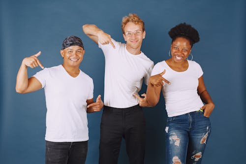 Three People Smiling at Camera