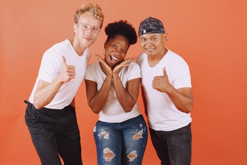 Three People Smiling at Camera