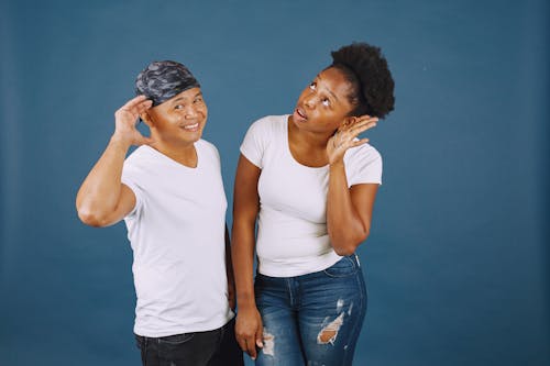 Man and Woman Doing Hand Gestures