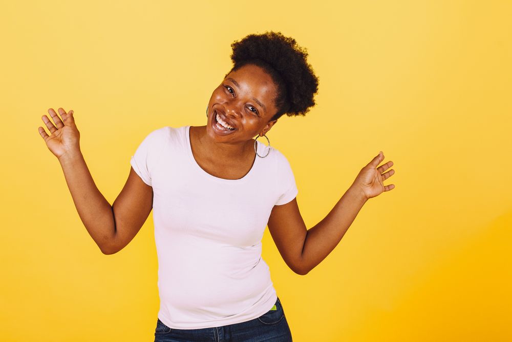 Person on a bright yellow studio backdrop — photo by Gustavo Fring on Pexels