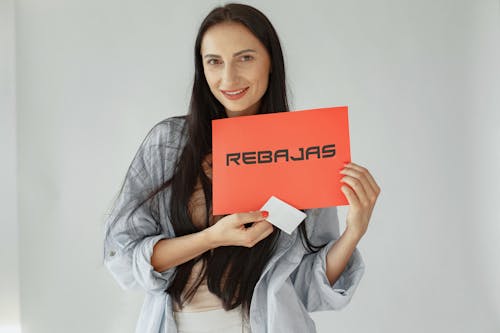 Free Woman and Rebajas Text Stock Photo