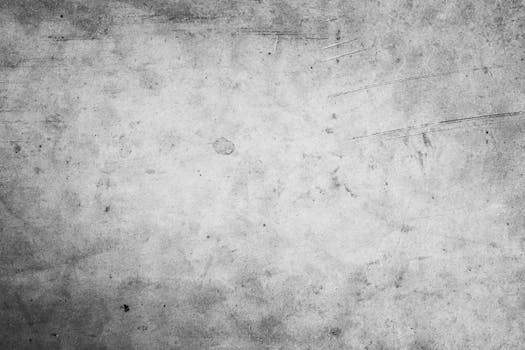 Grunge concrete texture background with scratches, ideal for creative design projects and copy space.
