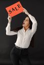 Woman in White Dress Shirt Holding Red and White Heart Paper