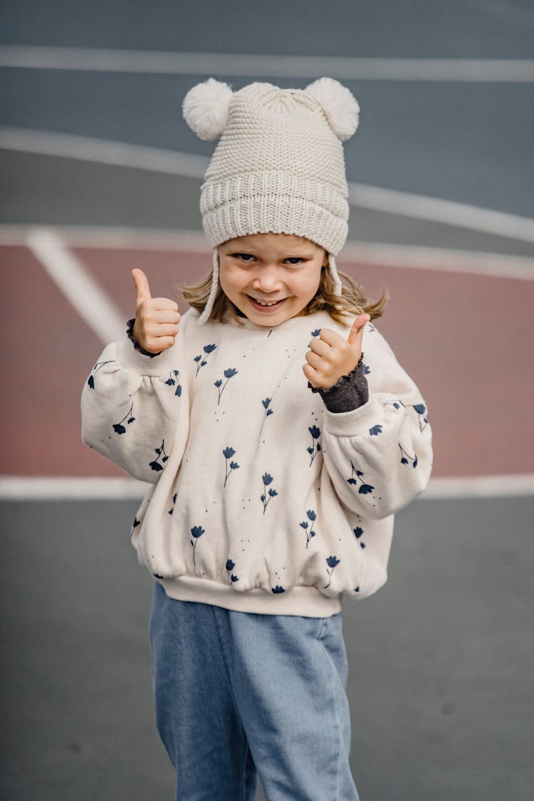 Cute Little Girl In Playground