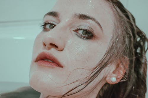 Free Woman with wet hair in bathtub Stock Photo