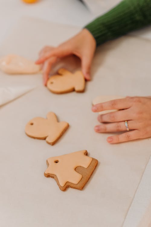 Free Person Holding A Christmas Cookie Stock Photo