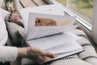 Person Holding White Printer Paper