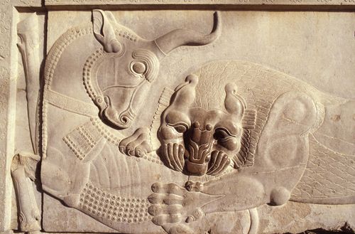 Free Detail of an ancient stone relief showcasing mythical creatures from Assyrian art. Stock Photo