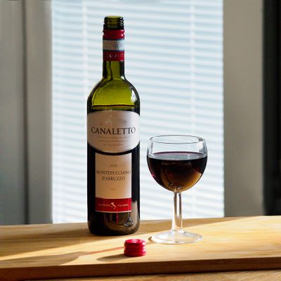 Bottle of red wine — photo by Brett Jordan on Pexels